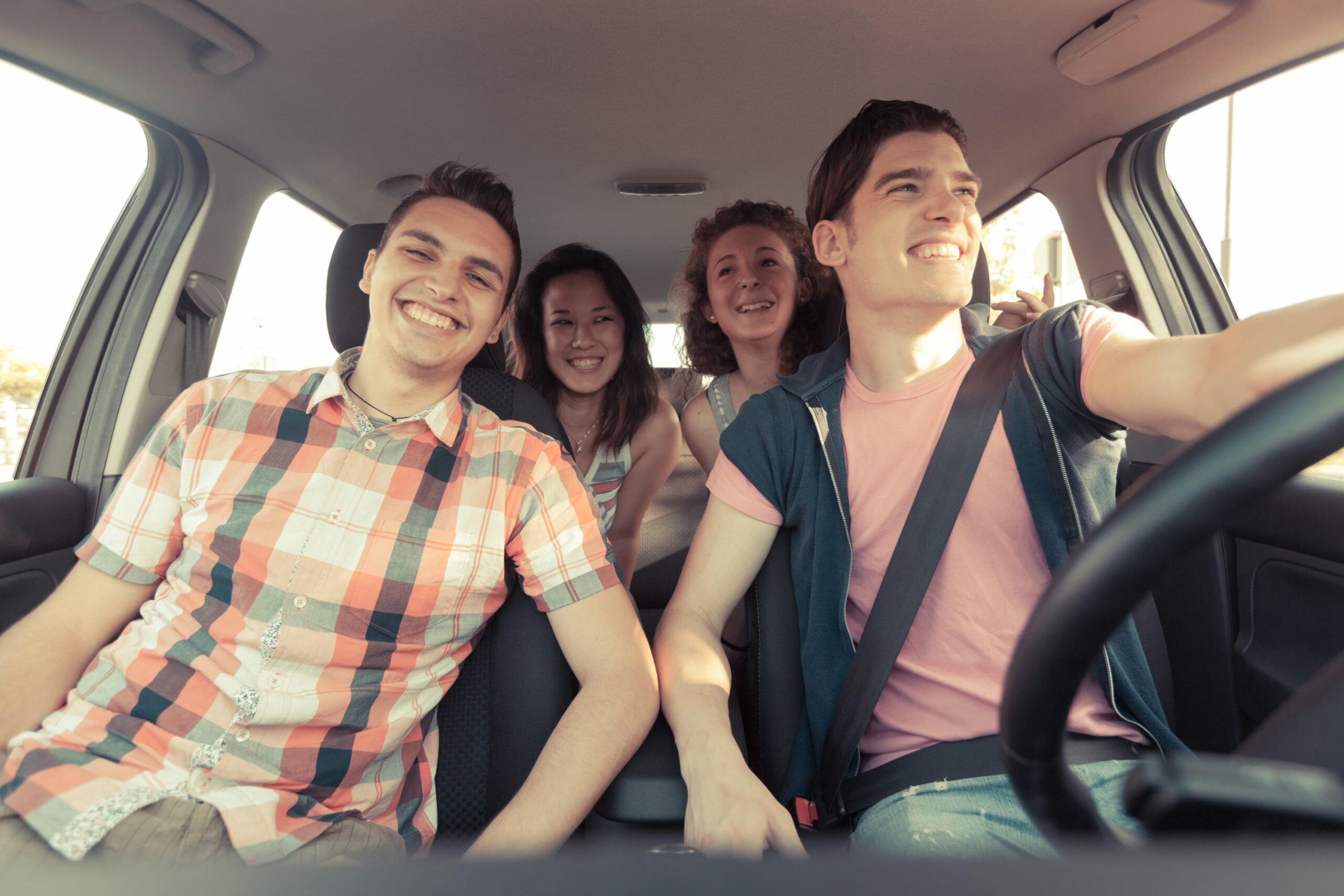 friends talking in car